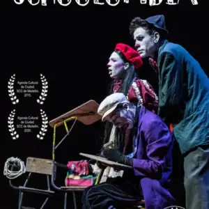 Cartel de Schoolombia: cuatro personajes de clown alrededor de un pupitre.